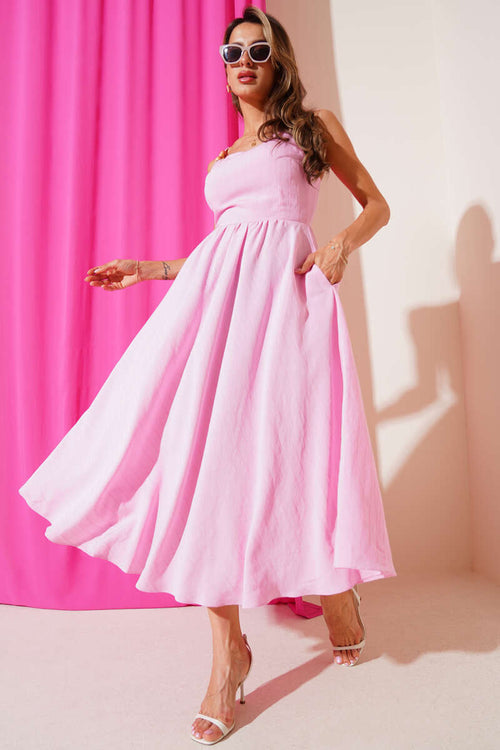 https://cdn.pazarium.com.tr/sirti-baglamali-askili-elbise-pembe-655224-15-B.jpg