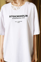 https://cdn.pazarium.com.tr/stockholm-yazili-t-shirt-beyaz-758801-18-B.jpg