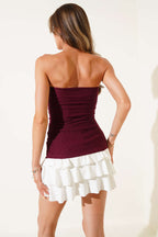 https://cdn.pazarium.com.tr/straplez-dugme-detayli-bluz-bordo-638112-15-B.jpg