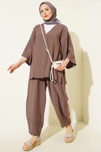 https://cdn.pazarium.com.tr/tek-dugmeli-tensel-kimono-ikili-takim-kahve-799268-19-B.jpg