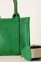 https://cdn.pazarium.com.tr/the-tote-bag-mini-canta-yesil-469374-11-B.jpg
