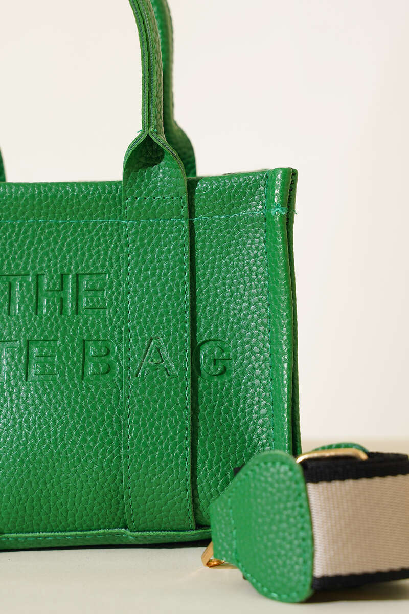 https://cdn.pazarium.com.tr/the-tote-bag-mini-canta-yesil-469374-11-B.jpg