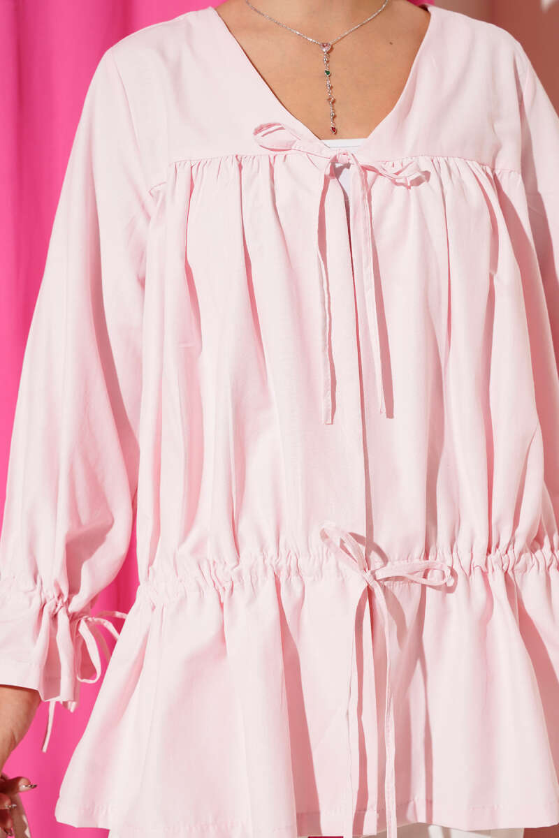 https://cdn.pazarium.com.tr/tunelli-buzgulu-kimono-pembe-656955-15-B.jpg