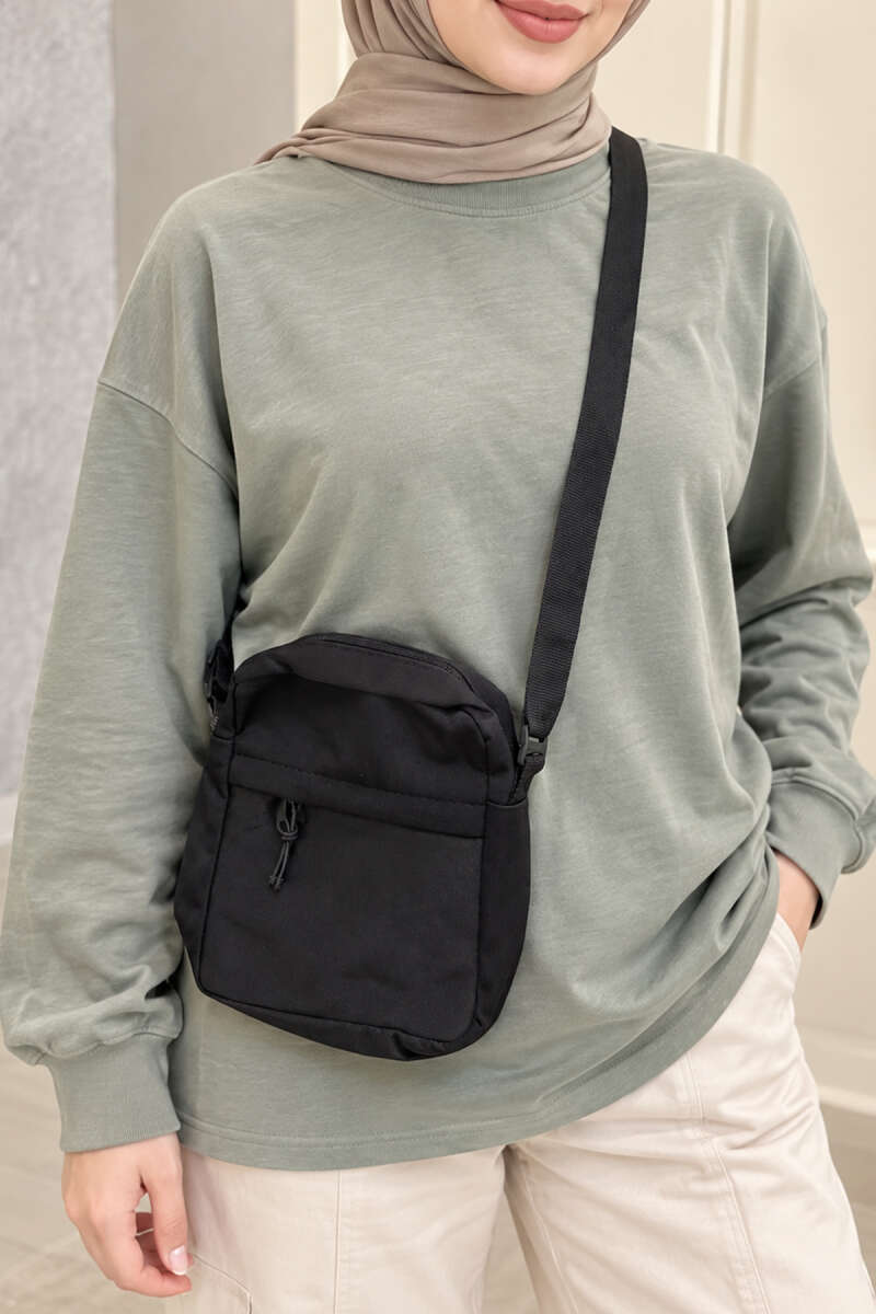 https://cdn.pazarium.com.tr/unisex-fermuarli-capraz-askili-canta-siyah-828920-20-B.jpg