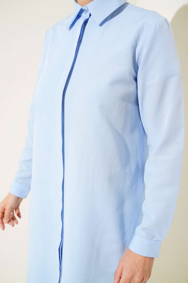 https://cdn.pazarium.com.tr/uzun-model-klasik-yaka-tunik-buz-mavisi-559439-13-B.jpg