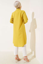 https://cdn.pazarium.com.tr/uzun-model-klasik-yaka-tunik-fistik-yesili-646949-13-B.jpg