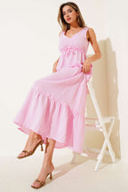 https://cdn.pazarium.com.tr/v-yaka-bel-lastikli-muslin-elbise-pembe-655246-15-B.jpg