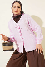 https://cdn.pazarium.com.tr/v-yaka-cizgili-bagcikli-gomlek-pembe-794161-19-B.jpg