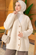 https://cdn.pazarium.com.tr/v-yaka-dugmeli-oversize-triko-hirka-ekru-826692-20-B.jpg