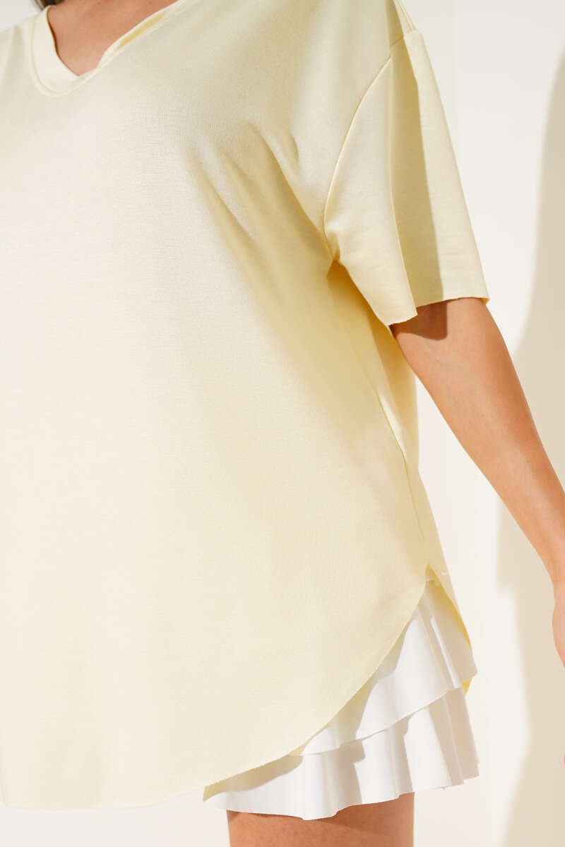 https://cdn.pazarium.com.tr/v-yaka-oval-kesim-t-shirt-sari-641304-15-B.jpg