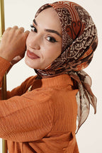https://cdn.pazarium.com.tr/vera-etnik-motifli-esarp-camel-814401-20-B.jpg