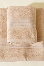 https://cdn.pazarium.com.tr/vina-banyo-havlu-2li-takim-bej-583997-13-B.jpg