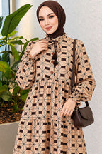 https://cdn.pazarium.com.tr/yaka-bagcikli-dugmeli-elbise-camel-833180-20-B.jpg