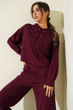 https://cdn.pazarium.com.tr/yaka-bagcikli-loysa-sweatshirt-ikili-takim-murdum-715608-17-B.jpg