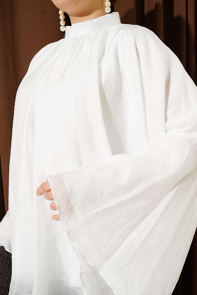 https://cdn.pazarium.com.tr/yaka-buzgulu-oversize-tunik-beyaz-801182-19-B.jpg