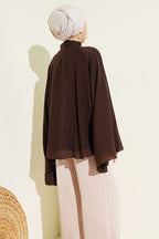 https://cdn.pazarium.com.tr/yaka-buzgulu-oversize-tunik-kahve-801178-19-B.jpg