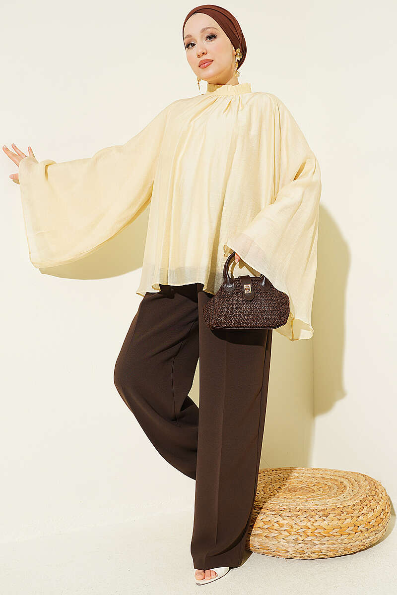 https://cdn.pazarium.com.tr/yaka-buzgulu-oversize-tunik-sari-801165-19-B.jpg