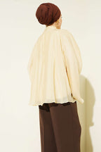 https://cdn.pazarium.com.tr/yaka-buzgulu-oversize-tunik-sari-801169-19-B.jpg