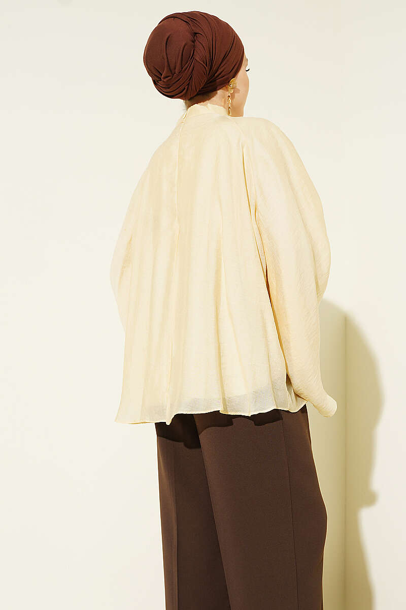 https://cdn.pazarium.com.tr/yaka-buzgulu-oversize-tunik-sari-801169-19-B.jpg