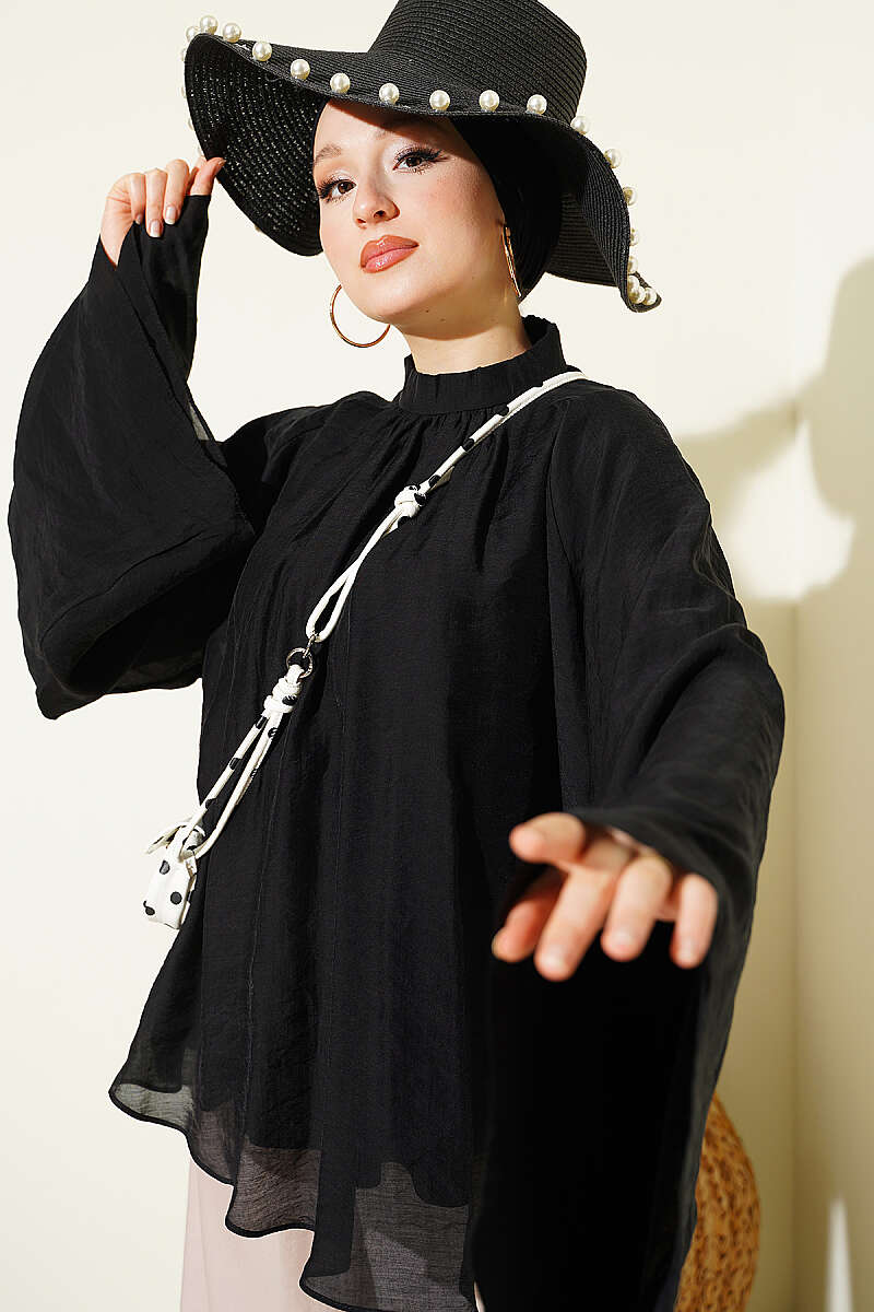 https://cdn.pazarium.com.tr/yaka-buzgulu-oversize-tunik-siyah-801159-19-B.jpg