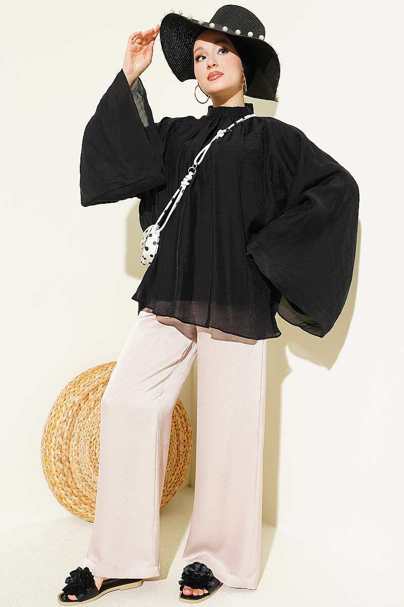 https://cdn.pazarium.com.tr/yaka-buzgulu-oversize-tunik-siyah-801161-19-B.jpg