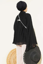 https://cdn.pazarium.com.tr/yaka-buzgulu-oversize-tunik-siyah-801164-19-B.jpg