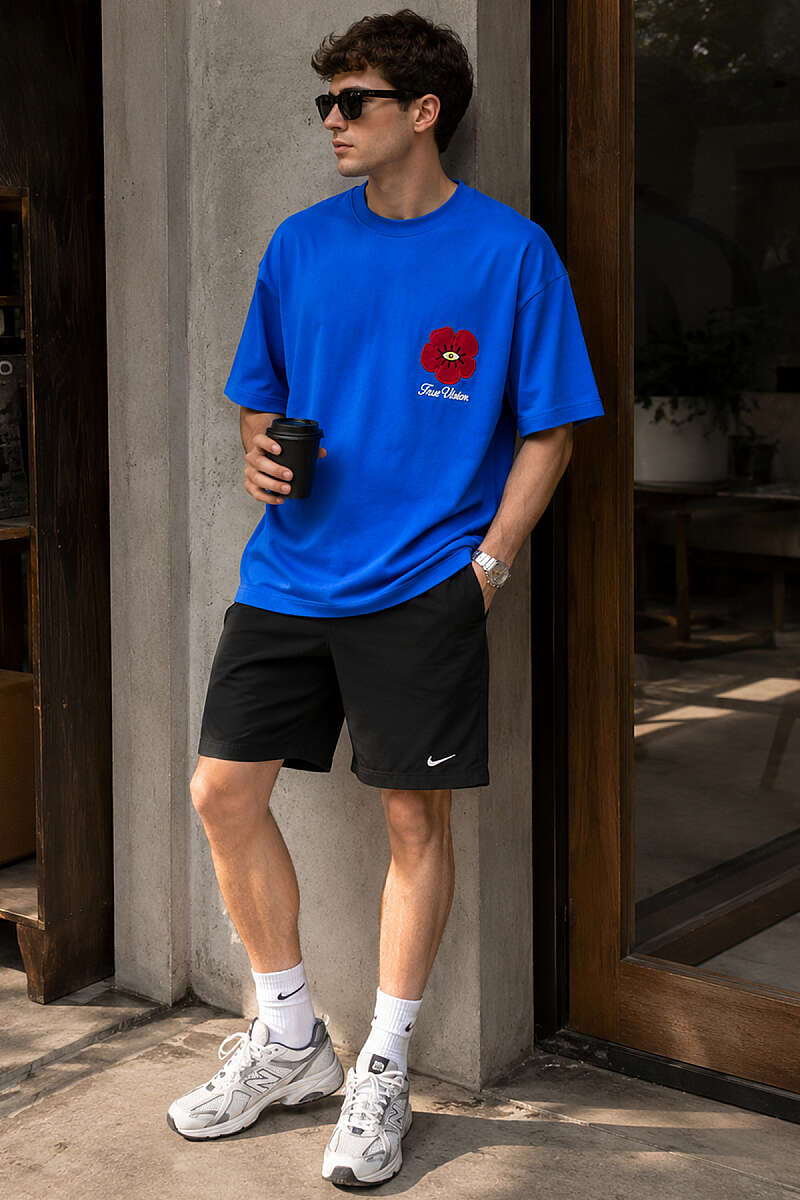 https://cdn.pazarium.com.tr/yaka-cicek-nakisli-erkek-oversize-t-shirt-saks-782455-19-B.jpg