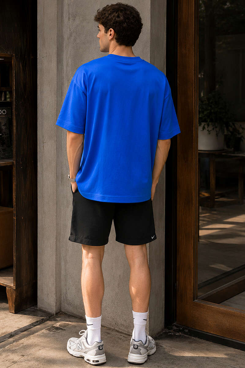 https://cdn.pazarium.com.tr/yaka-cicek-nakisli-erkek-oversize-t-shirt-saks-782456-19-B.jpg