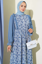 https://cdn.pazarium.com.tr/yaka-firfirli-desenli-sifon-elbise-mavi-816158-20-B.jpg
