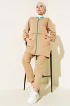https://cdn.pazarium.com.tr/yaka-ribanali-fermuarli-ikili-takim-camel-530983-12-B.jpg