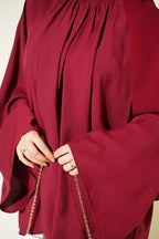 https://cdn.pazarium.com.tr/yakasi-buzgu-detayli-tunik-bordo-807643-19-B.jpg