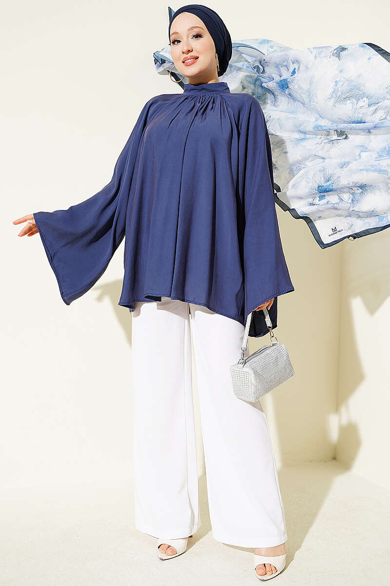 https://cdn.pazarium.com.tr/yakasi-buzgu-detayli-tunik-indigo-807633-19-B.jpg