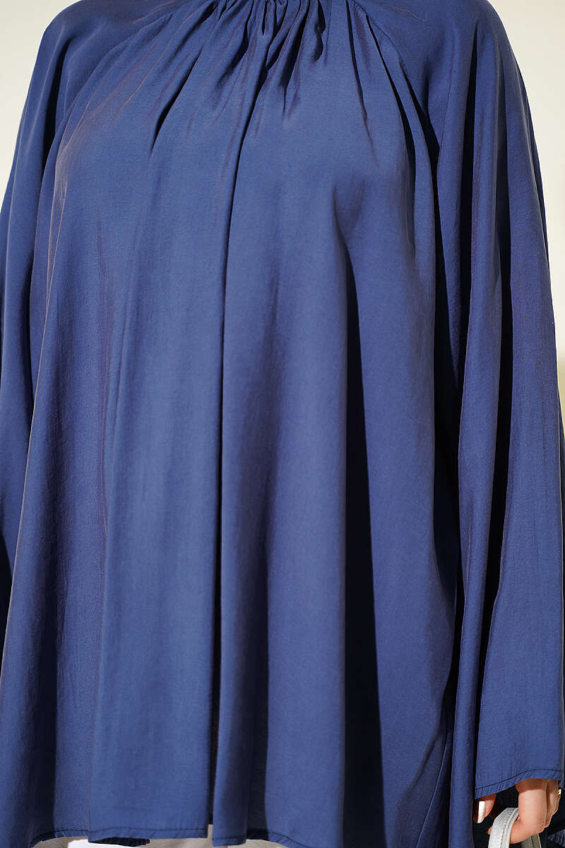 https://cdn.pazarium.com.tr/yakasi-buzgu-detayli-tunik-indigo-807635-19-B.jpg