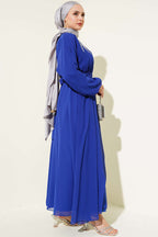 https://cdn.pazarium.com.tr/yakasi-tasli-kusakli-sifon-elbise-saks-587816-14-B.jpg