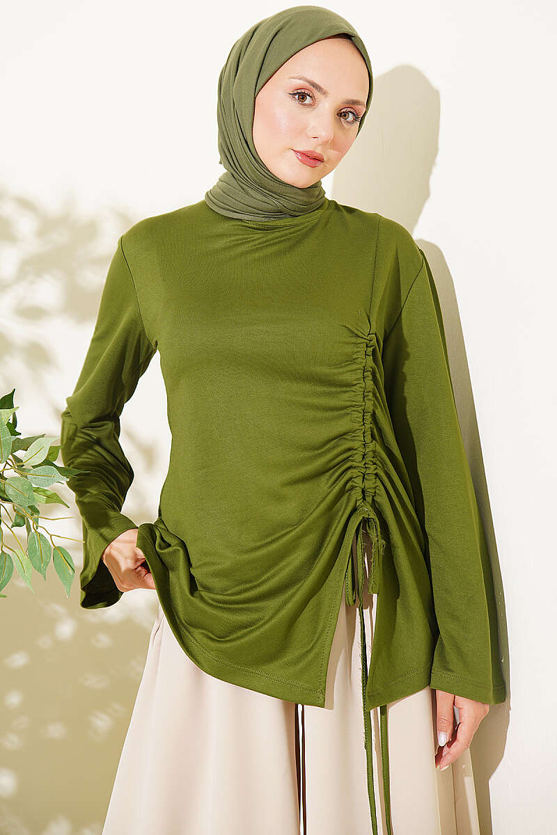 https://cdn.pazarium.com.tr/yan-ip-buzgulu-tunik-haki-812355-20-B.jpg