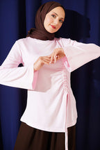 https://cdn.pazarium.com.tr/yan-ip-buzgulu-tunik-pembe-812369-20-B.jpg