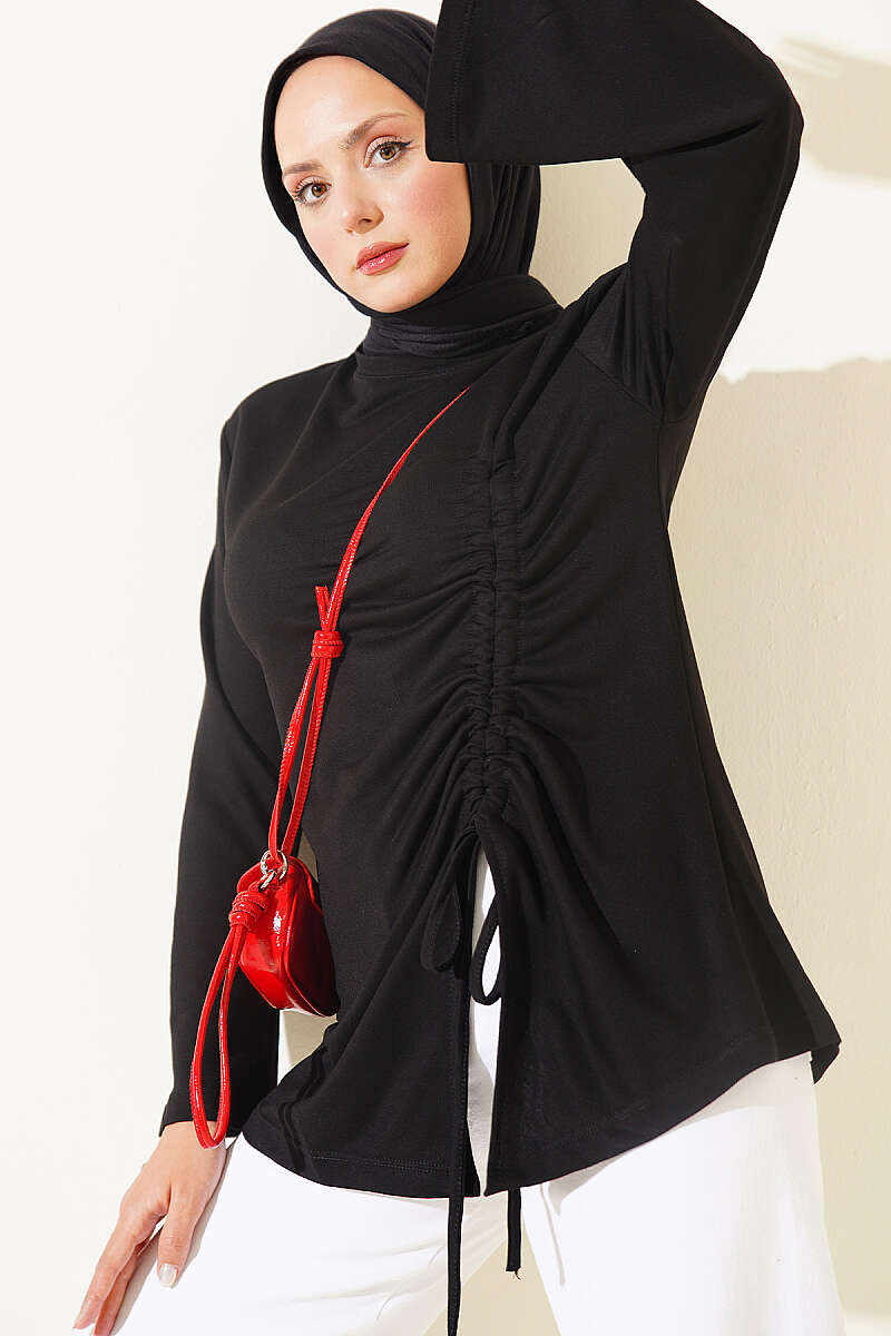 https://cdn.pazarium.com.tr/yan-ip-buzgulu-tunik-siyah-812381-20-B.jpg