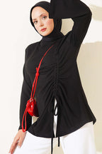 https://cdn.pazarium.com.tr/yan-ip-buzgulu-tunik-siyah-812381-20-B.jpg