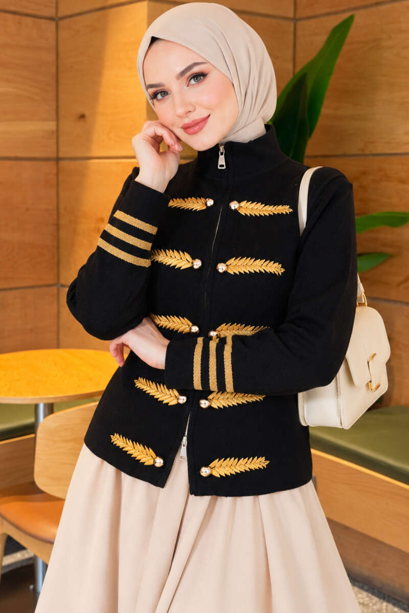 https://cdn.pazarium.com.tr/yaprak-nakisli-dugme-detayli-triko-hirka-siyah-839096-20-B.jpg