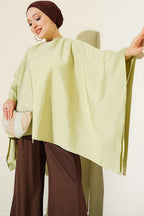 https://cdn.pazarium.com.tr/yarasa-kol-oversize-bluz-cagla-yesili-808303-19-B.jpg