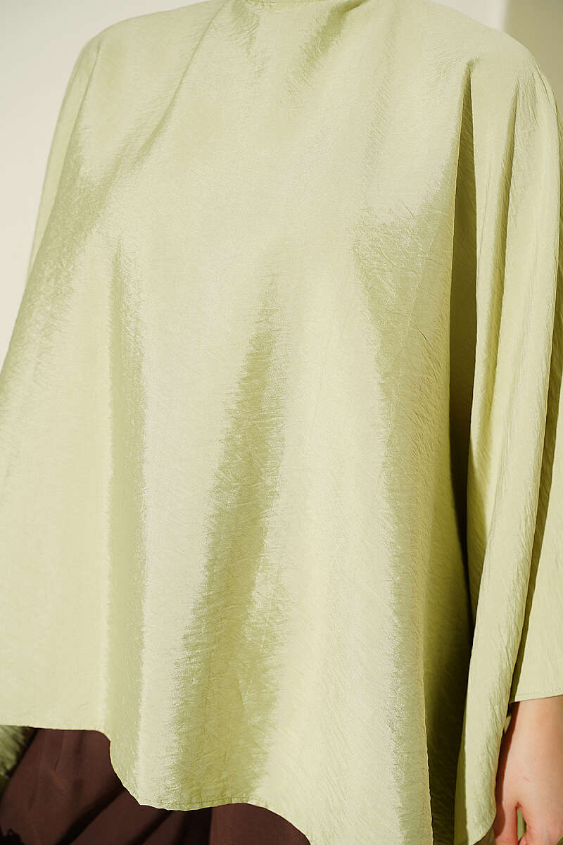 https://cdn.pazarium.com.tr/yarasa-kol-oversize-bluz-cagla-yesili-808306-19-B.jpg