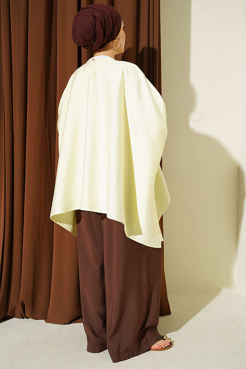https://cdn.pazarium.com.tr/yarasa-kol-oversize-bluz-sari-808325-19-B.jpg