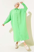 https://cdn.pazarium.com.tr/yarasa-kol-oversize-uzun-gomlek-yesil-559487-13-B.jpg