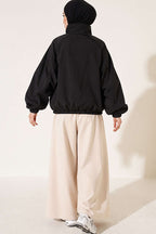 https://cdn.pazarium.com.tr/yarasa-kollu-oversize-ceket-siyah-842359-20-B.jpg