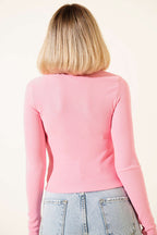 https://cdn.pazarium.com.tr/yarim-fermuarli-kaskorse-bluz-pembe-673190-16-B.jpg