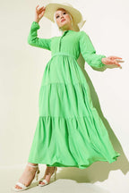 https://cdn.pazarium.com.tr/yarim-gizli-dugmeli-kusakli-elbise-neon-yesil-607326-14-B.jpg