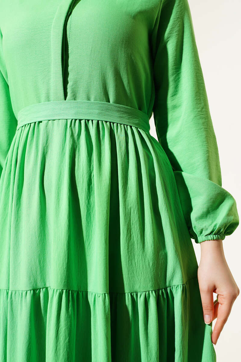 https://cdn.pazarium.com.tr/yarim-gizli-dugmeli-kusakli-elbise-neon-yesil-607329-14-B.jpg