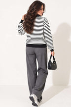 https://cdn.pazarium.com.tr/yarim-yaka-fermuarli-cizgili-sweatshirt-siyah-838767-20-B.jpg