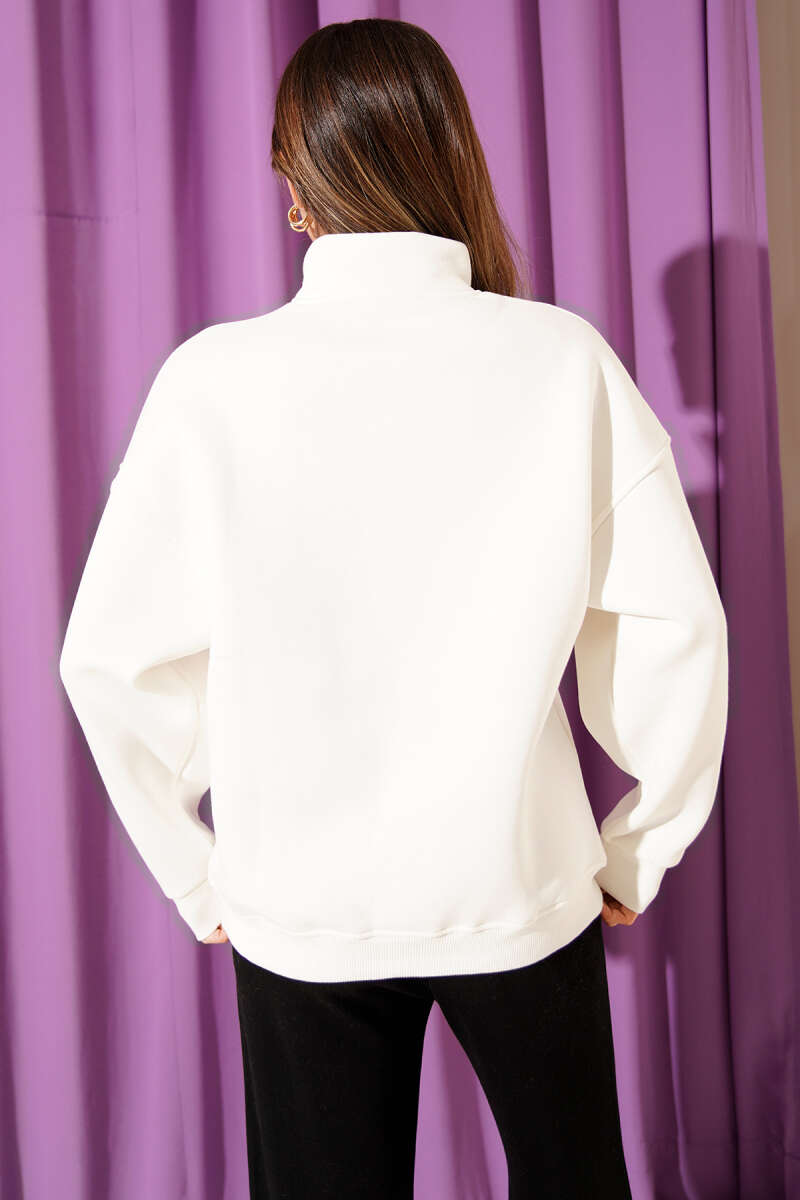 https://cdn.pazarium.com.tr/yazi-nakisli-fermuarli-sardonlu-sweatshirt-ekru-704366-17-B.jpg