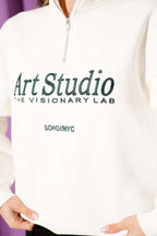 https://cdn.pazarium.com.tr/yazi-nakisli-fermuarli-sardonlu-sweatshirt-ekru-704368-17-B.jpg